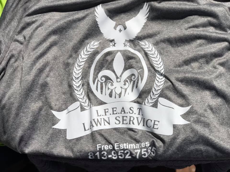 Screen printed t-shirt with detailed logo for L.F.E.A.S.T. Lawn Service